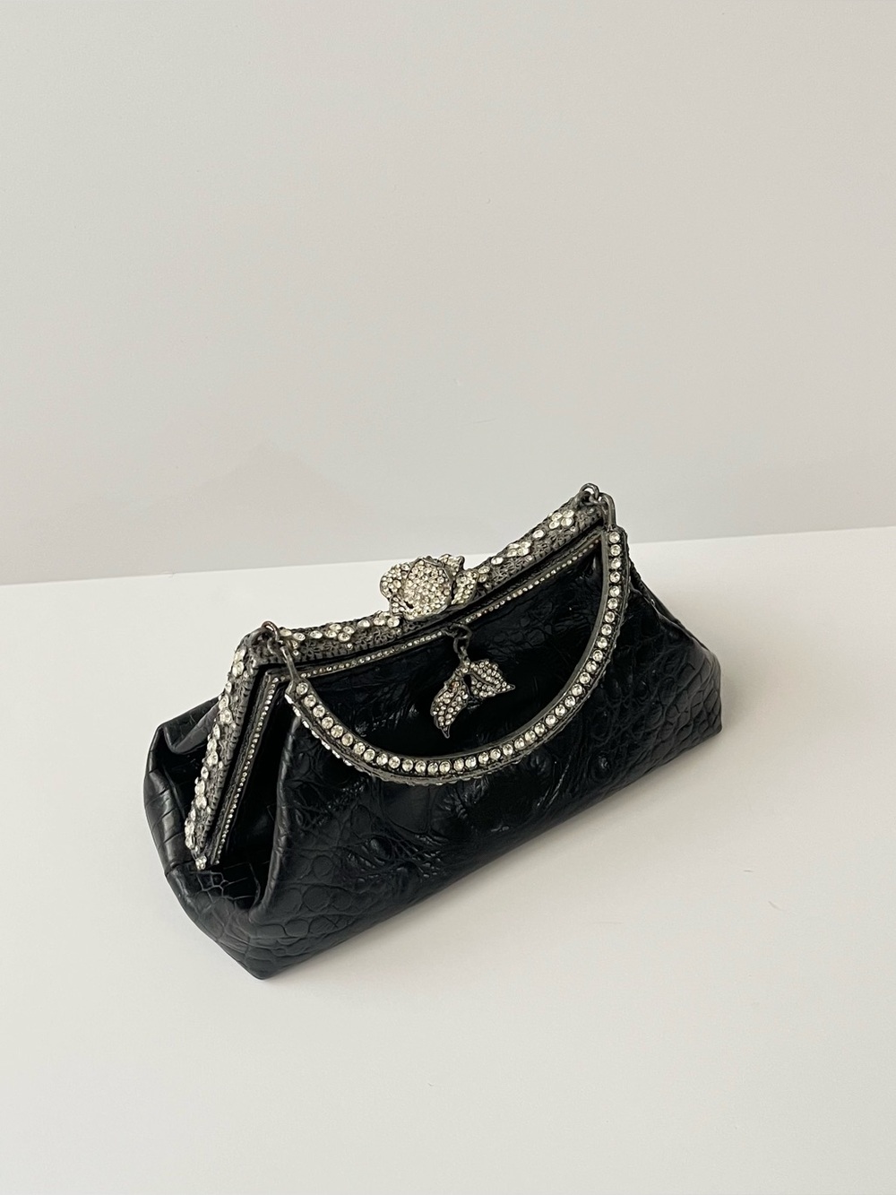 Vintage Besso black embossed clutch